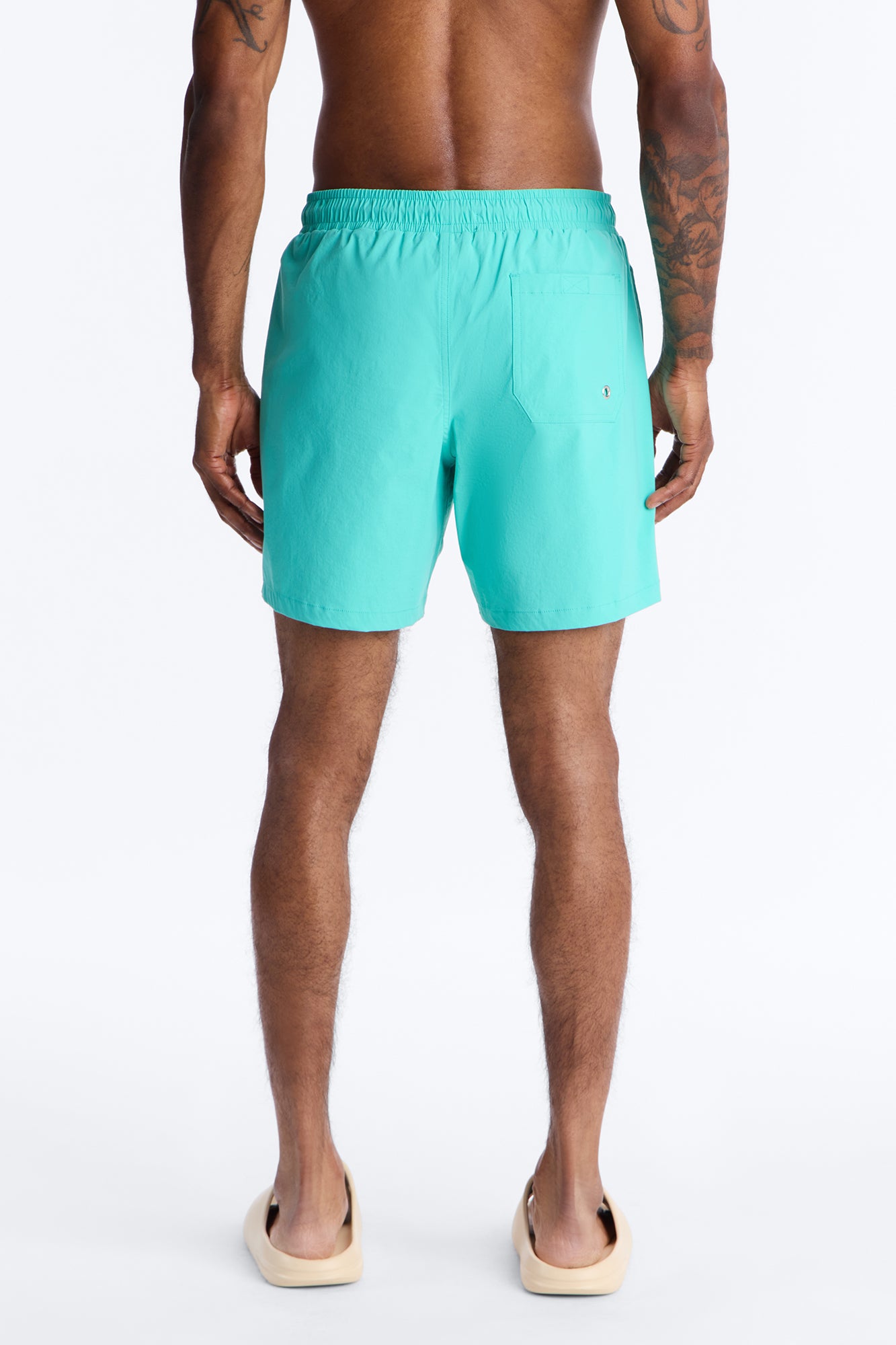 Montez Stretch Swim Trunk 7″ - Teal