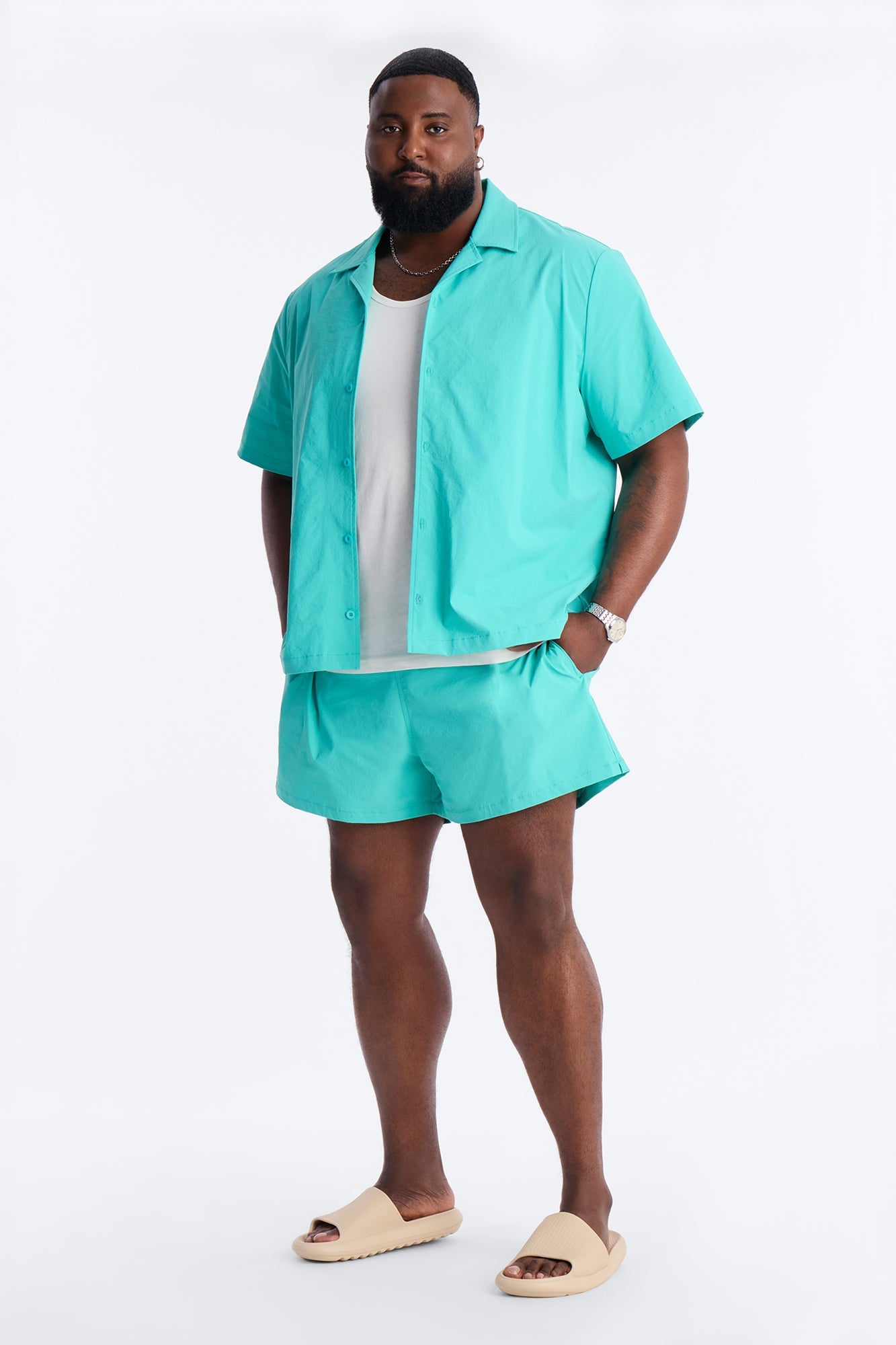 Montez Stretch Swim Trunk 4″ - Teal