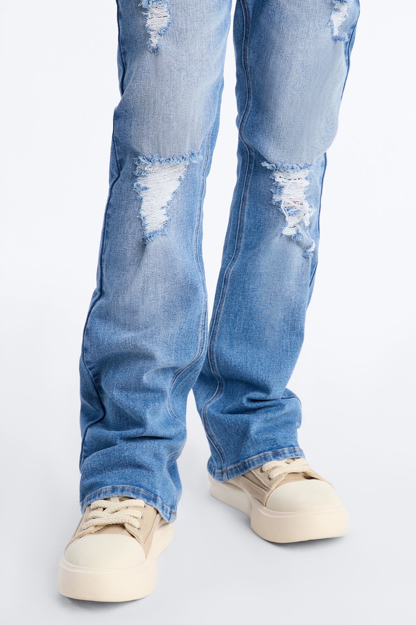 Essential Destroyed Stacked Skinny Flare Stretch Jean - Medium Blue Wash
